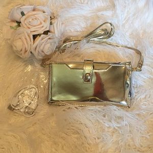 Gold color  wallet with phone charger